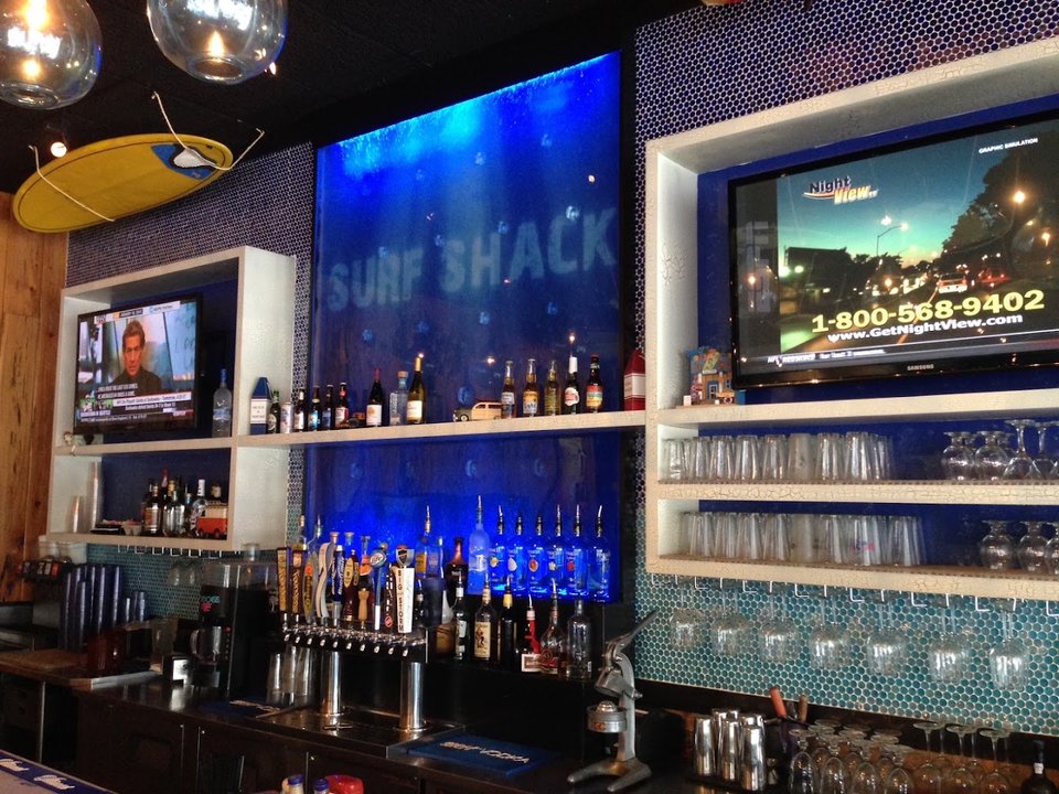 Casual dining room with sports bar seating.